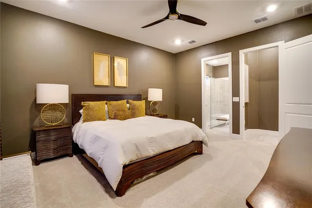 a bathroom with a sink a toilet a shower and a mirror