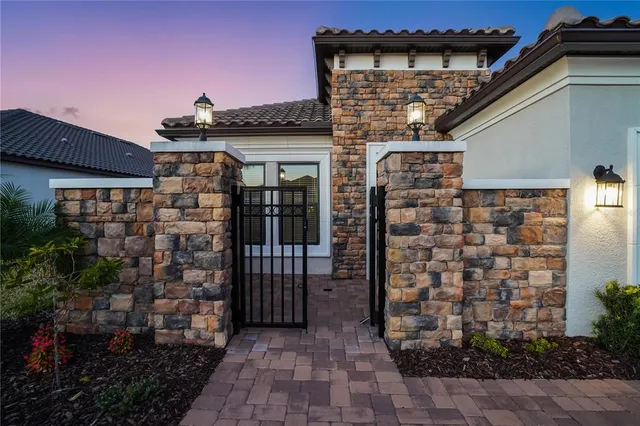 a view of an empty room with a fireplace