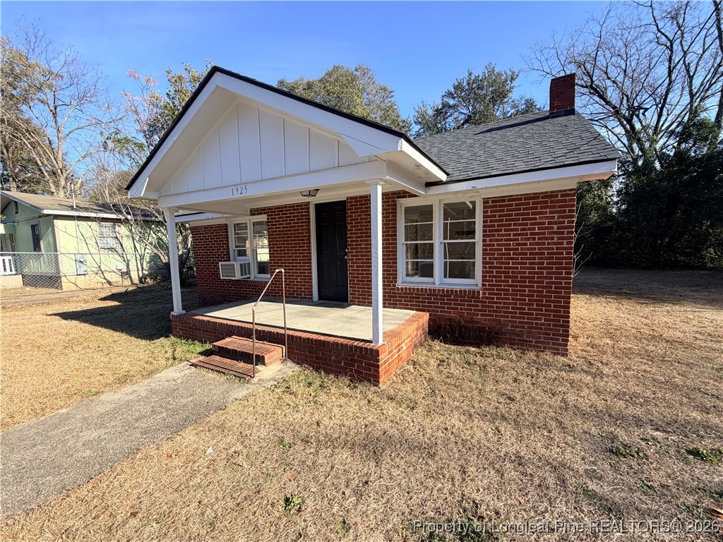1925 Progress Street Fayetteville, NC 28306 - Photo 2 of 12 a view of a house with backyard porch and sitting area
