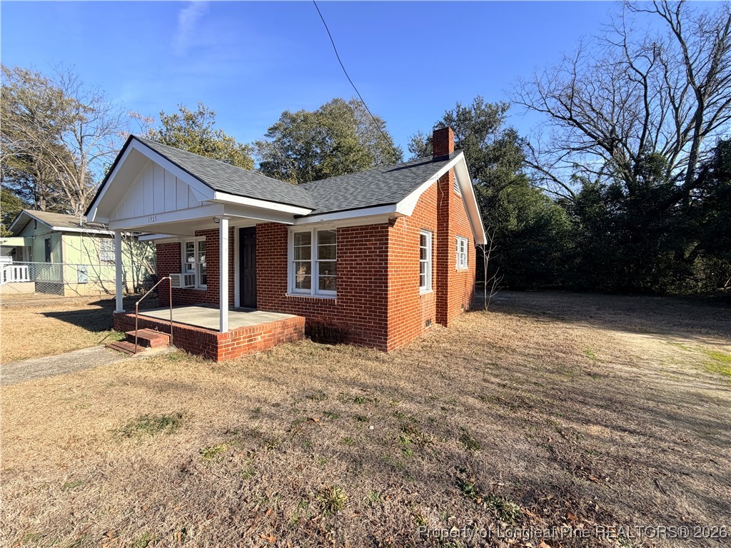 1925 Progress Street Fayetteville, NC 28306 - Photo 3 of 12 a view of a house with backyard and porch