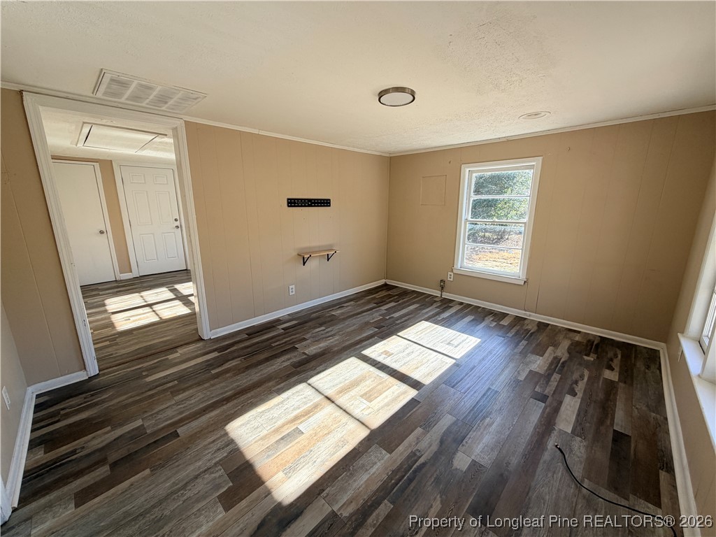 1925 Progress Street Fayetteville, NC 28306 - Photo 4 of 12 a view of wooden floor and windows in a room