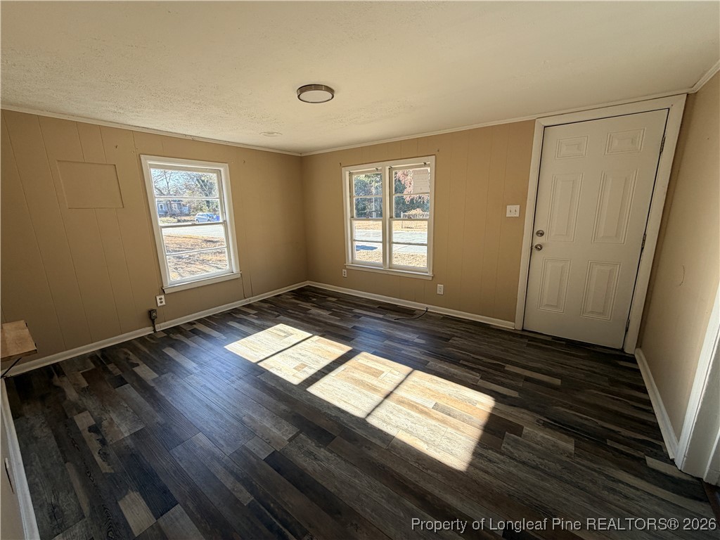 1925 Progress Street Fayetteville, NC 28306 - Photo 5 of 12 a view of empty room with wooden floor and window