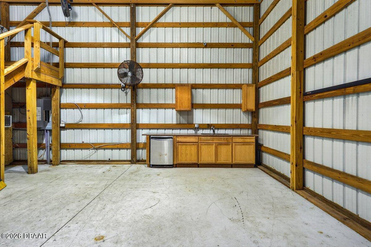 1700 Tomoka Farms Road Port Orange, FL 32128 - Photo 14 of 43 a view of an empty room with a window