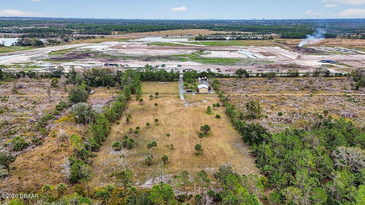 1700 Tomoka Farms Road Port Orange, FL 32128 - Photo 24 of 43 a view of an ocean and beach