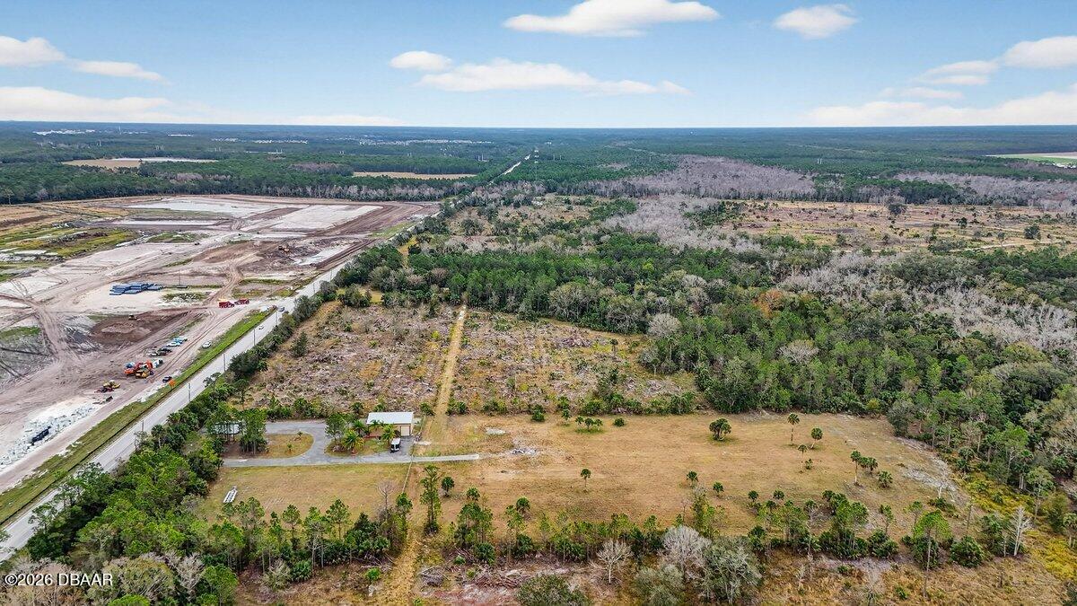 1700 Tomoka Farms Road Port Orange, FL 32128 - Photo 25 of 43 a view of a lake with a mountain