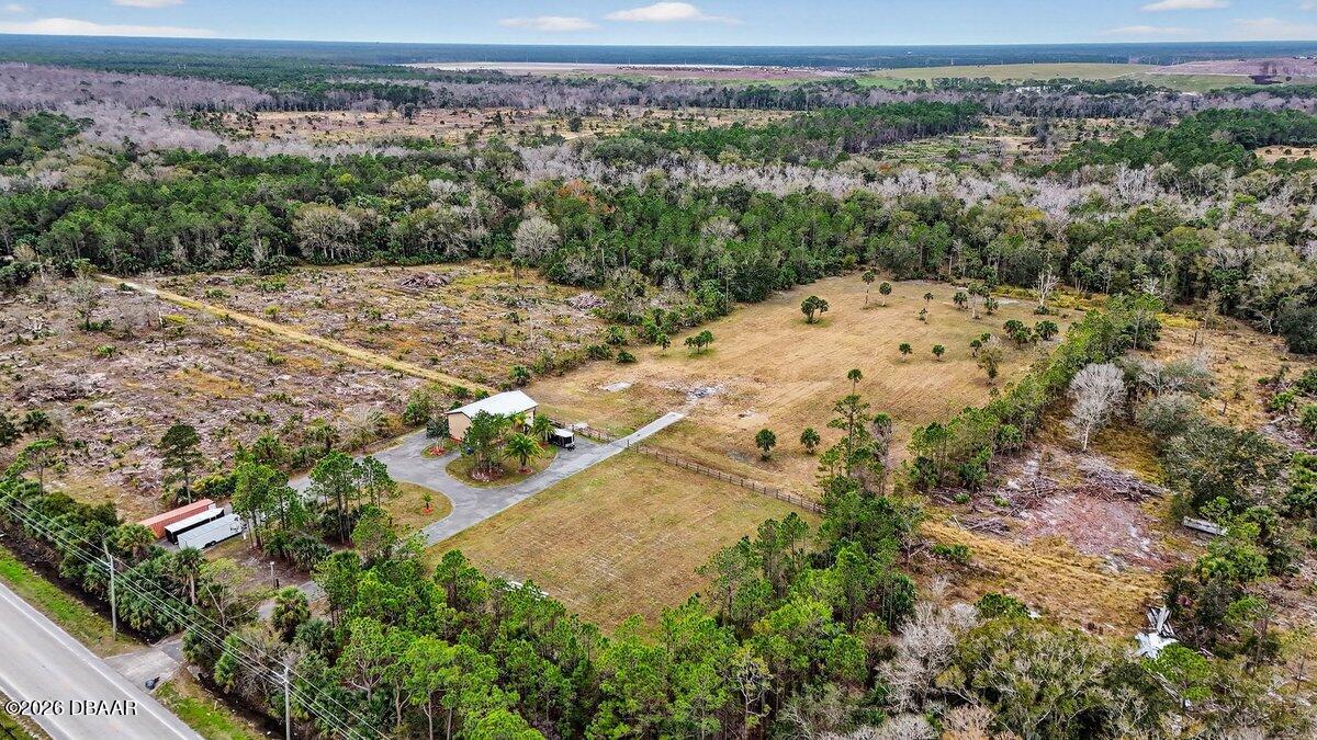 1700 Tomoka Farms Road Port Orange, FL 32128 - Photo 26 of 43 a view of a yard with a mountain