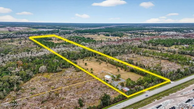 a view of swimming pool with a balcony