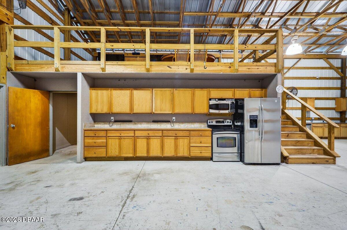 1700 Tomoka Farms Road Port Orange, FL 32128 - Photo 8 of 43 a view of a indoor swimming pool