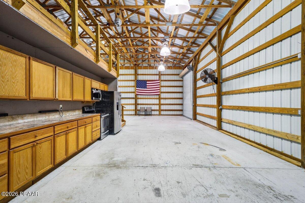 1700 Tomoka Farms Road Port Orange, FL 32128 - Photo 10 of 43 a view of entryway and hall with wooden floor