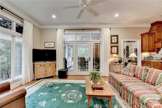 a view of a dining room with furniture and window