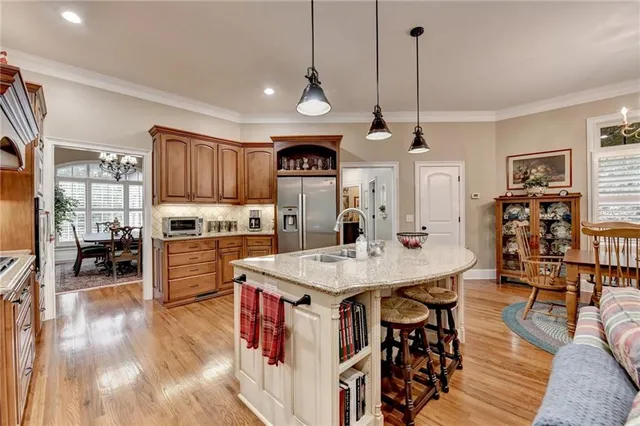 a view of a dining room with furniture and window