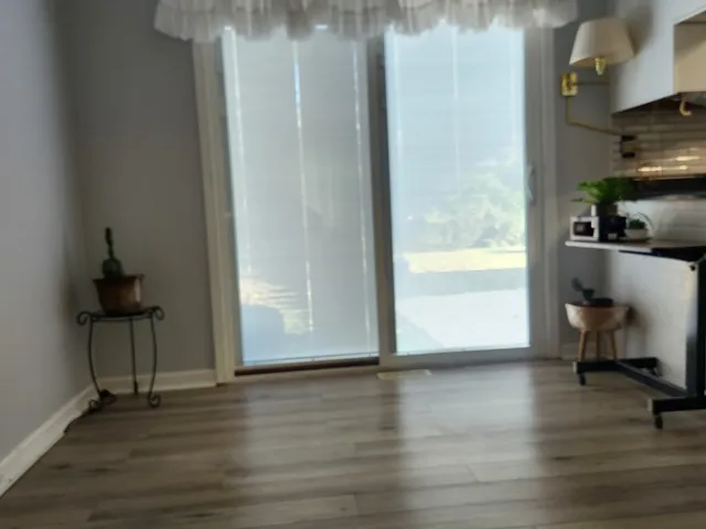 a view of livingroom with furniture and wooden floor