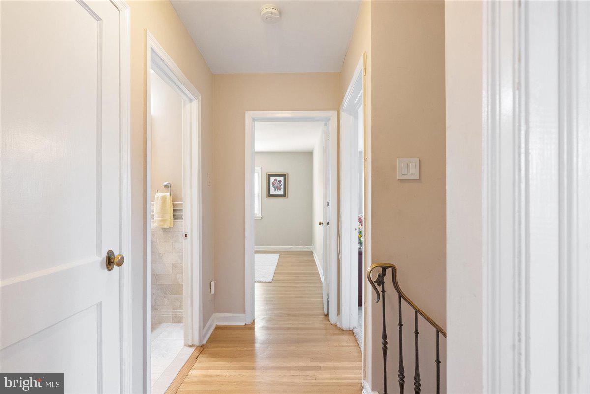 1615 Earlington Road Havertown, PA 19083 - Photo 22 of 72 a view of a bathroom from a hallway
