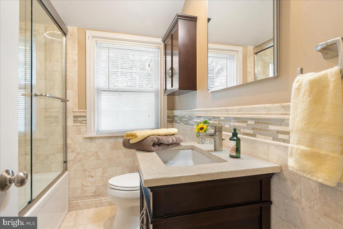1615 Earlington Road Havertown, PA 19083 - Photo 31 of 72 a bathroom with a sink toilet and shower