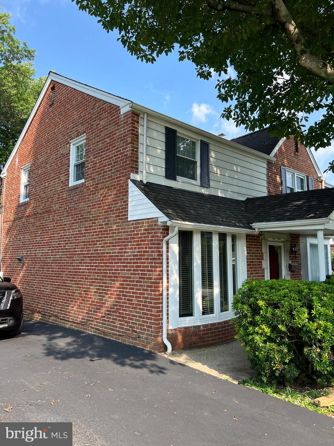 1615 Earlington Road Havertown, PA 19083 - Photo 49 of 72 a front view of a house with a garden