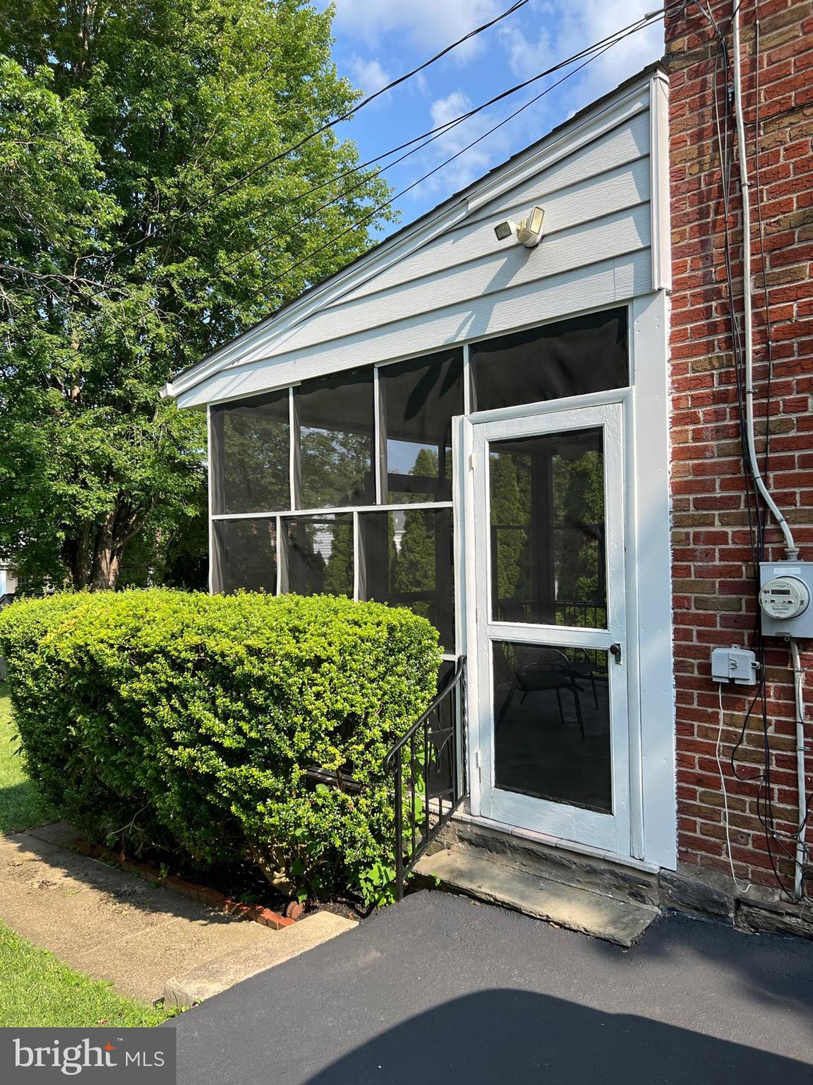 1615 Earlington Road Havertown, PA 19083 - Photo 51 of 72 a front view of a house with a garden