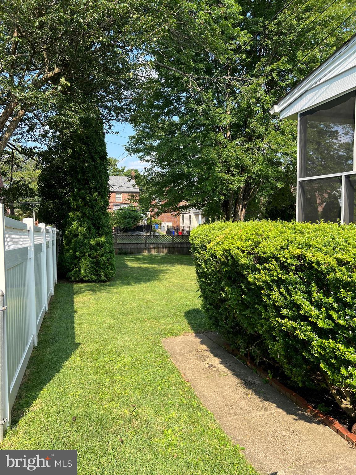 1615 Earlington Road Havertown, PA 19083 - Photo 52 of 72 a view of a backyard with large trees