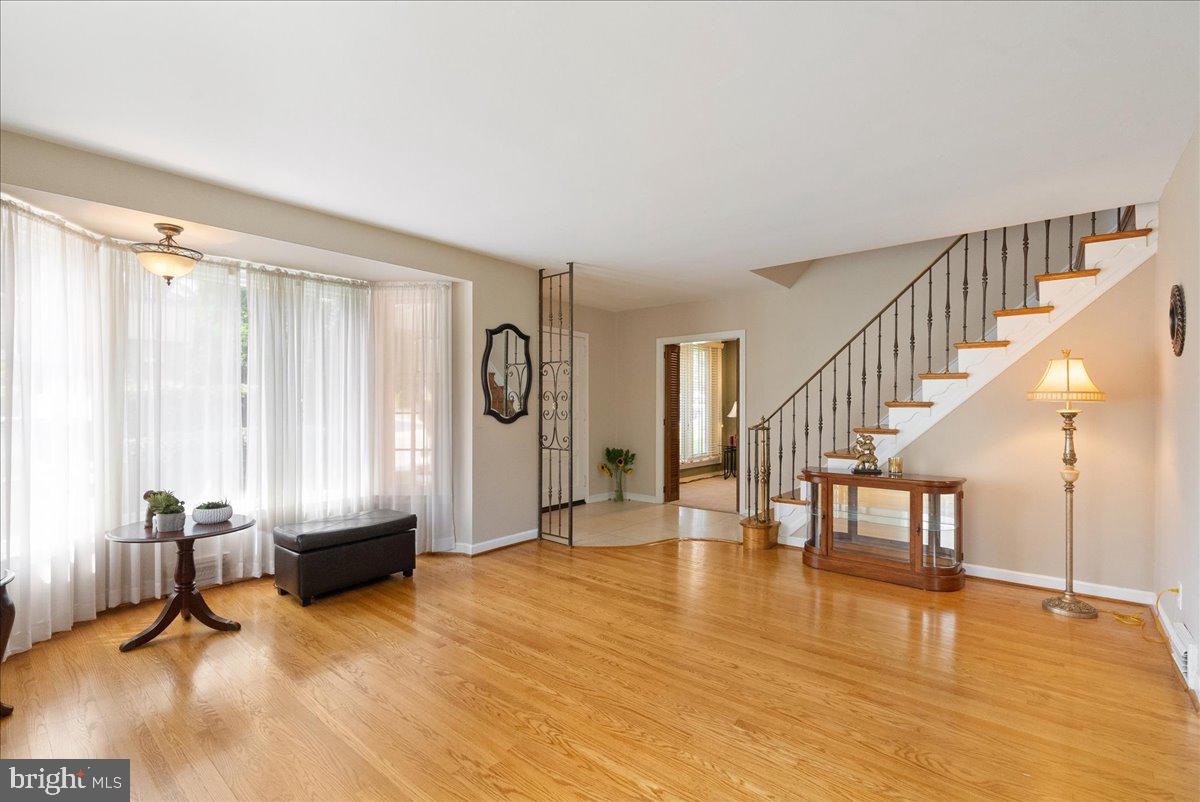 1615 Earlington Road Havertown, PA 19083 - Photo 6 of 72 a view of livingroom with hardwood floor and windows