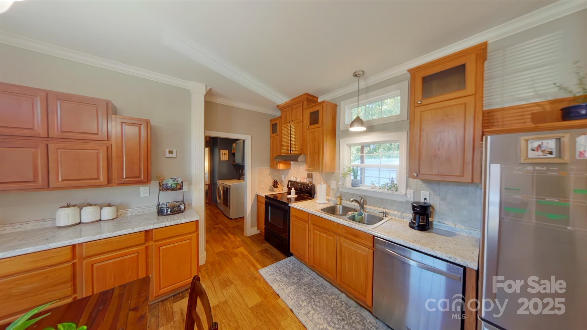 249 Brown Neal Road York, SC 29745 - Photo 5 of 24 a kitchen with stainless steel appliances granite countertop a sink stove and refrigerator