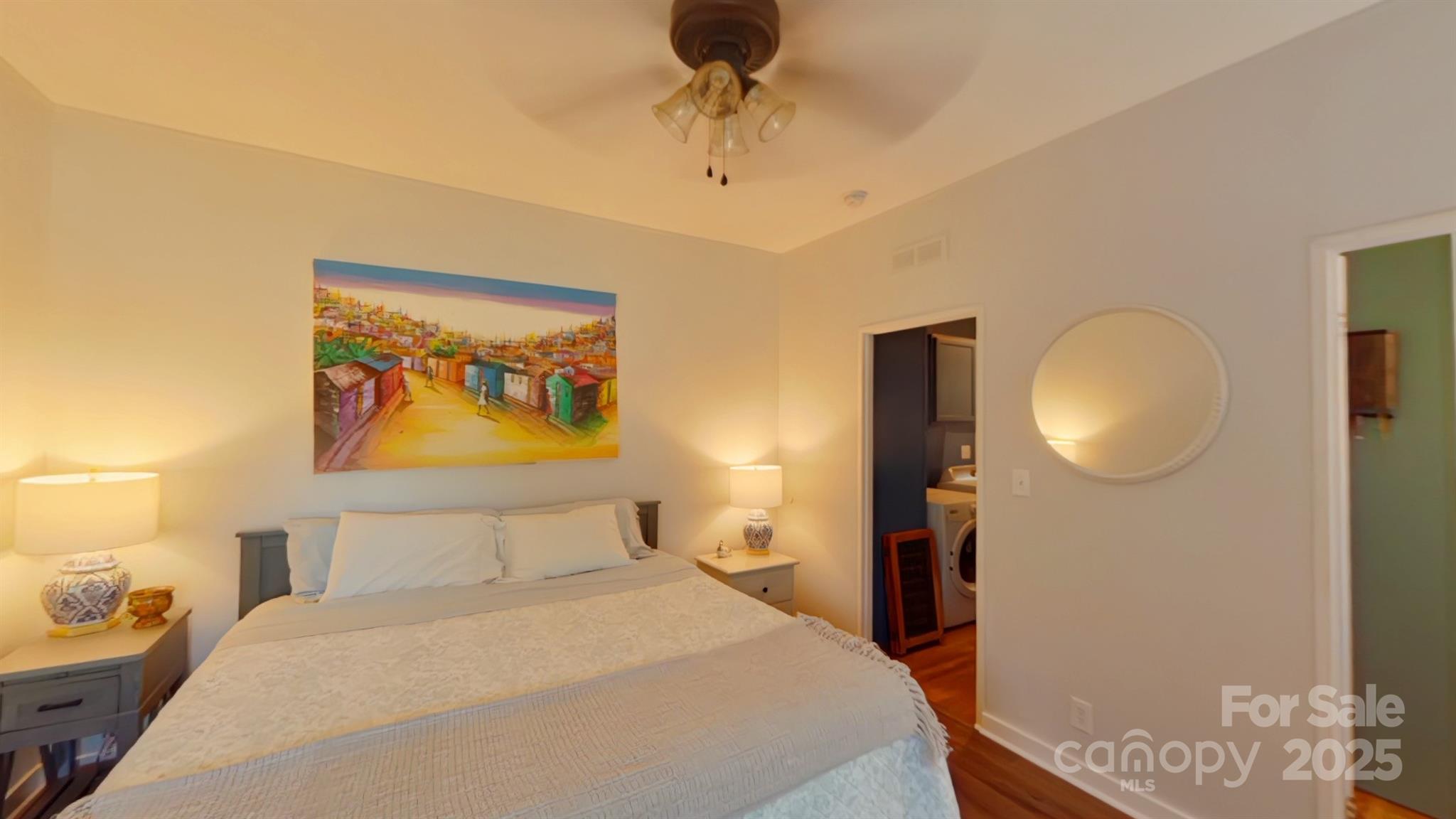 249 Brown Neal Road York, SC 29745 - Photo 9 of 24 a bedroom with a bed and a chandelier