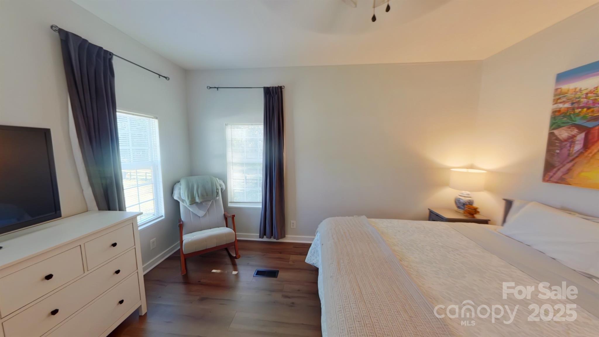 249 Brown Neal Road York, SC 29745 - Photo 10 of 24 a bedroom with a bed and wooden floor