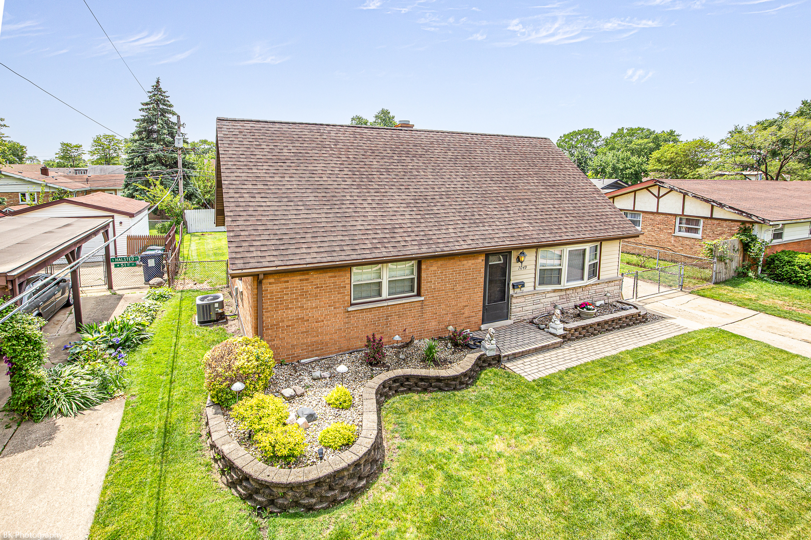 7049 West 91st Street Bridgeview, IL 60455 - Photo 17 of 25 a aerial view of a house with swimming pool garden and patio