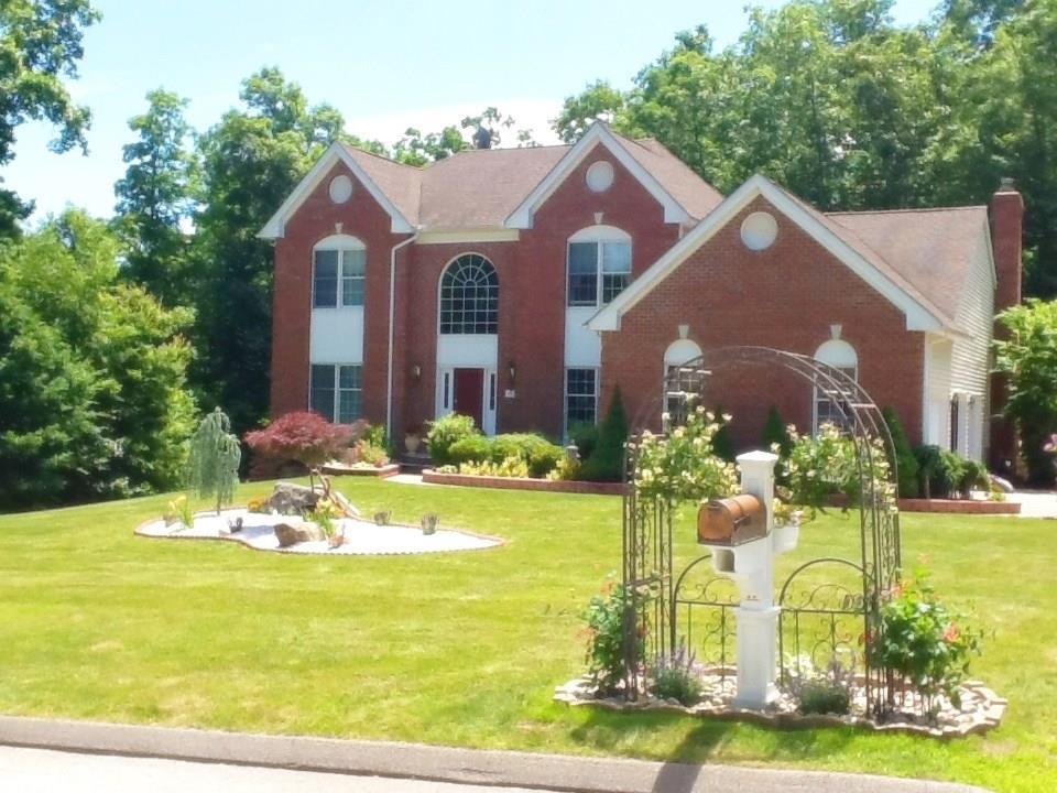 22 Eastham Bridge Road East Hampton, CT 06424 - Photo 1 of 1 a front view of house with yard