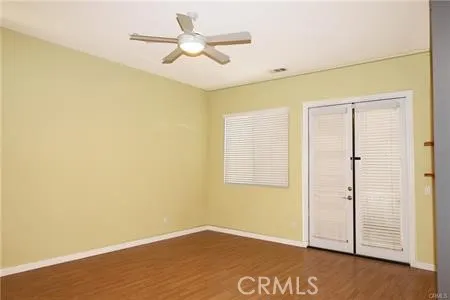 a spacious bathroom with a granite countertop tub sink and mirror