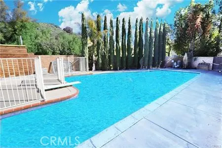 a view of a house with swimming pool