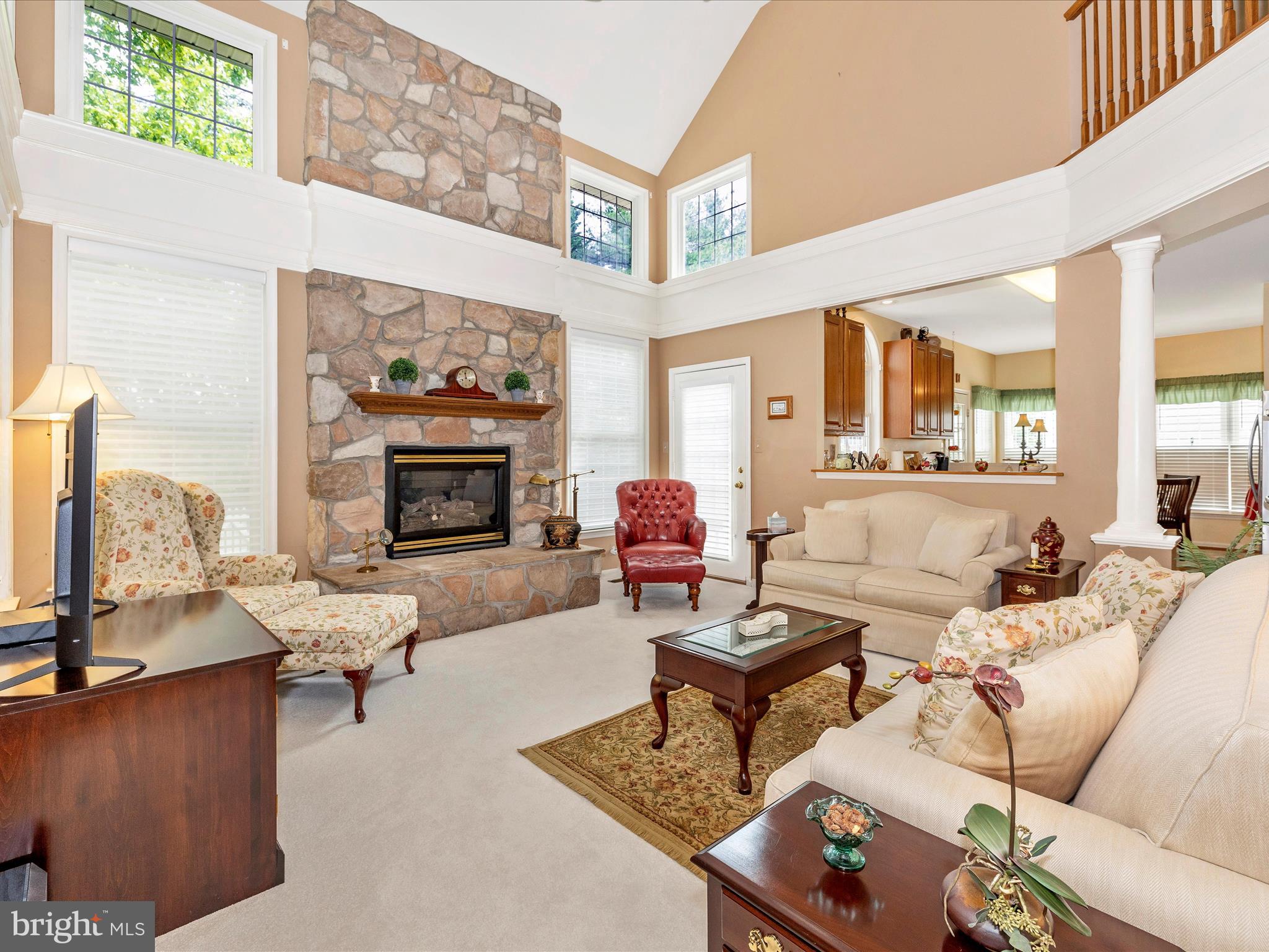 2594 Bear Den Road Frederick, MD 21701 - Photo 11 of 72 a living room with furniture and a fireplace