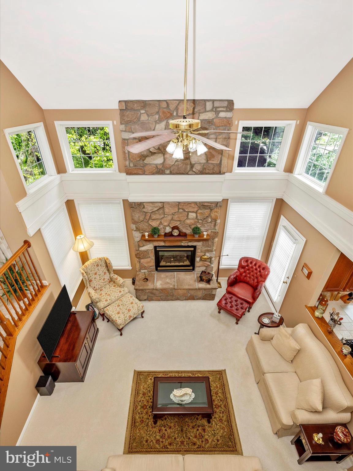 2594 Bear Den Road Frederick, MD 21701 - Photo 13 of 72 a living room with furniture and a fireplace