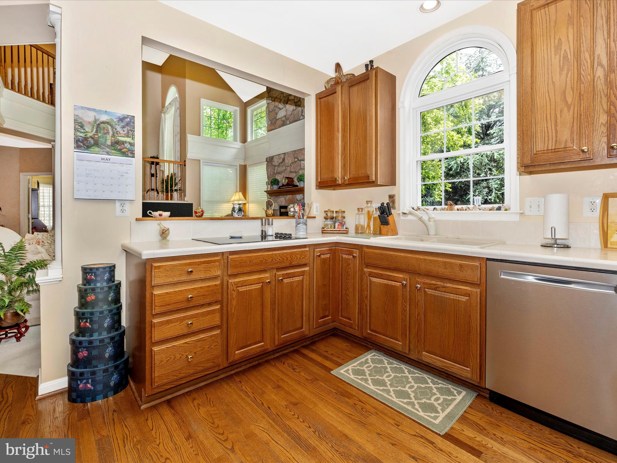 2594 Bear Den Road Frederick, MD 21701 - Photo 17 of 72 a kitchen with a sink window and cabinets