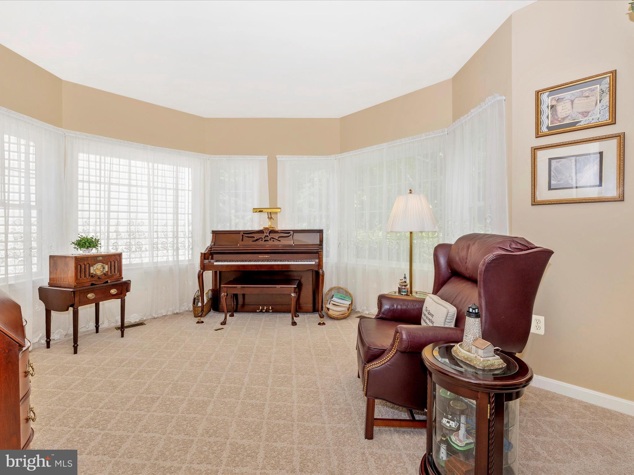 2594 Bear Den Road Frederick, MD 21701 - Photo 20 of 72 a living room with furniture a piano and a window