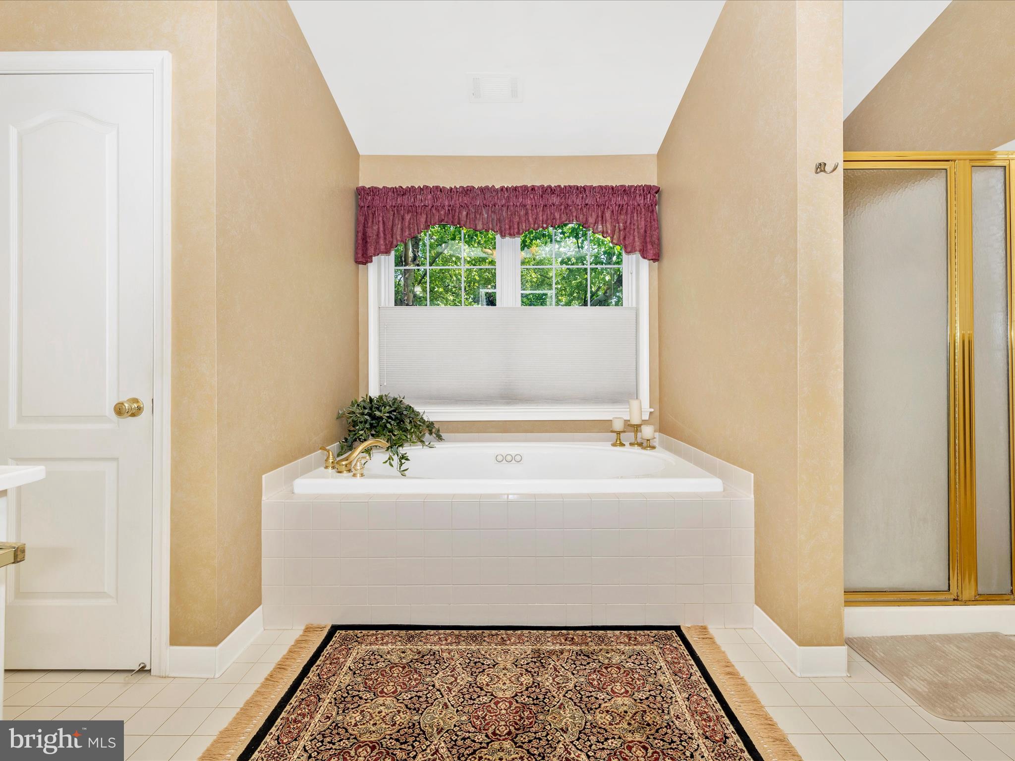 2594 Bear Den Road Frederick, MD 21701 - Photo 28 of 72 a bathroom with a bathtub