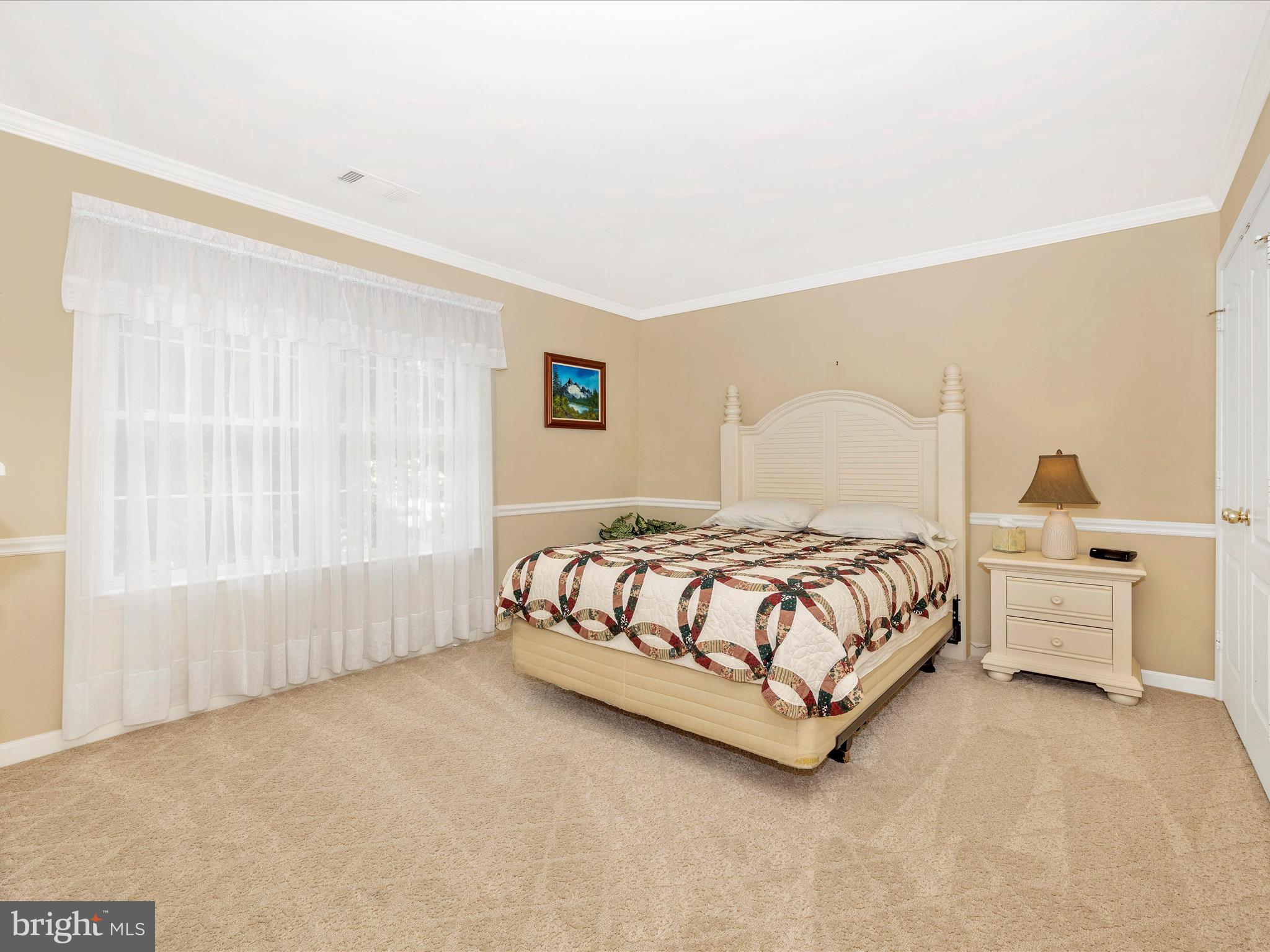 2594 Bear Den Road Frederick, MD 21701 - Photo 30 of 72 a bedroom with a bed and window