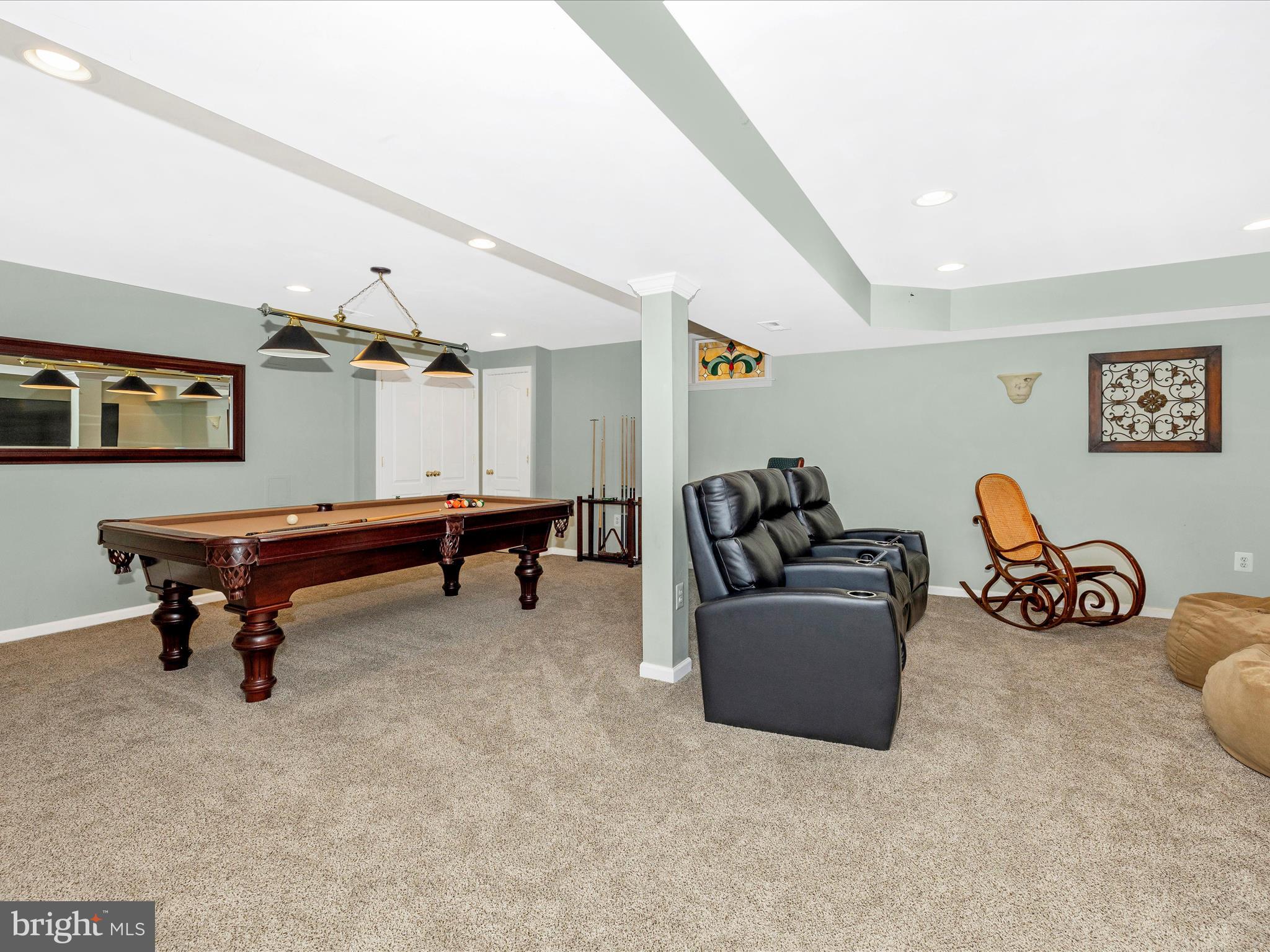 2594 Bear Den Road Frederick, MD 21701 - Photo 37 of 72 a living room with furniture and a rug