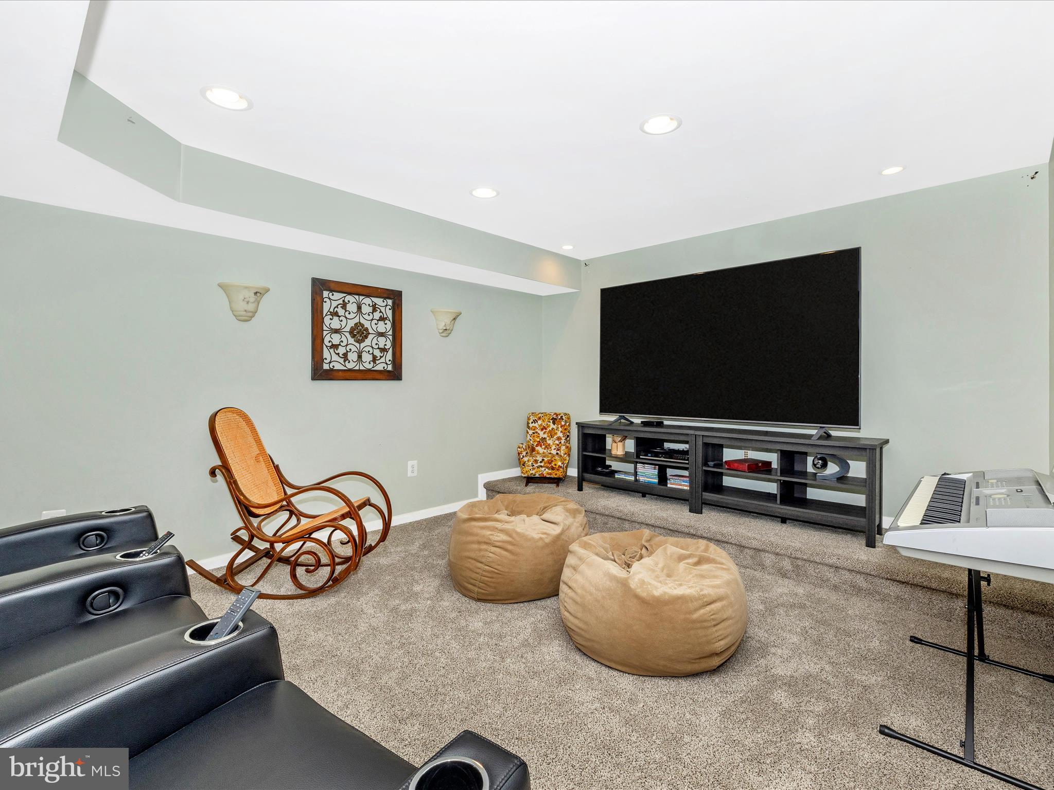 2594 Bear Den Road Frederick, MD 21701 - Photo 39 of 72 a room with furniture and a flat screen tv