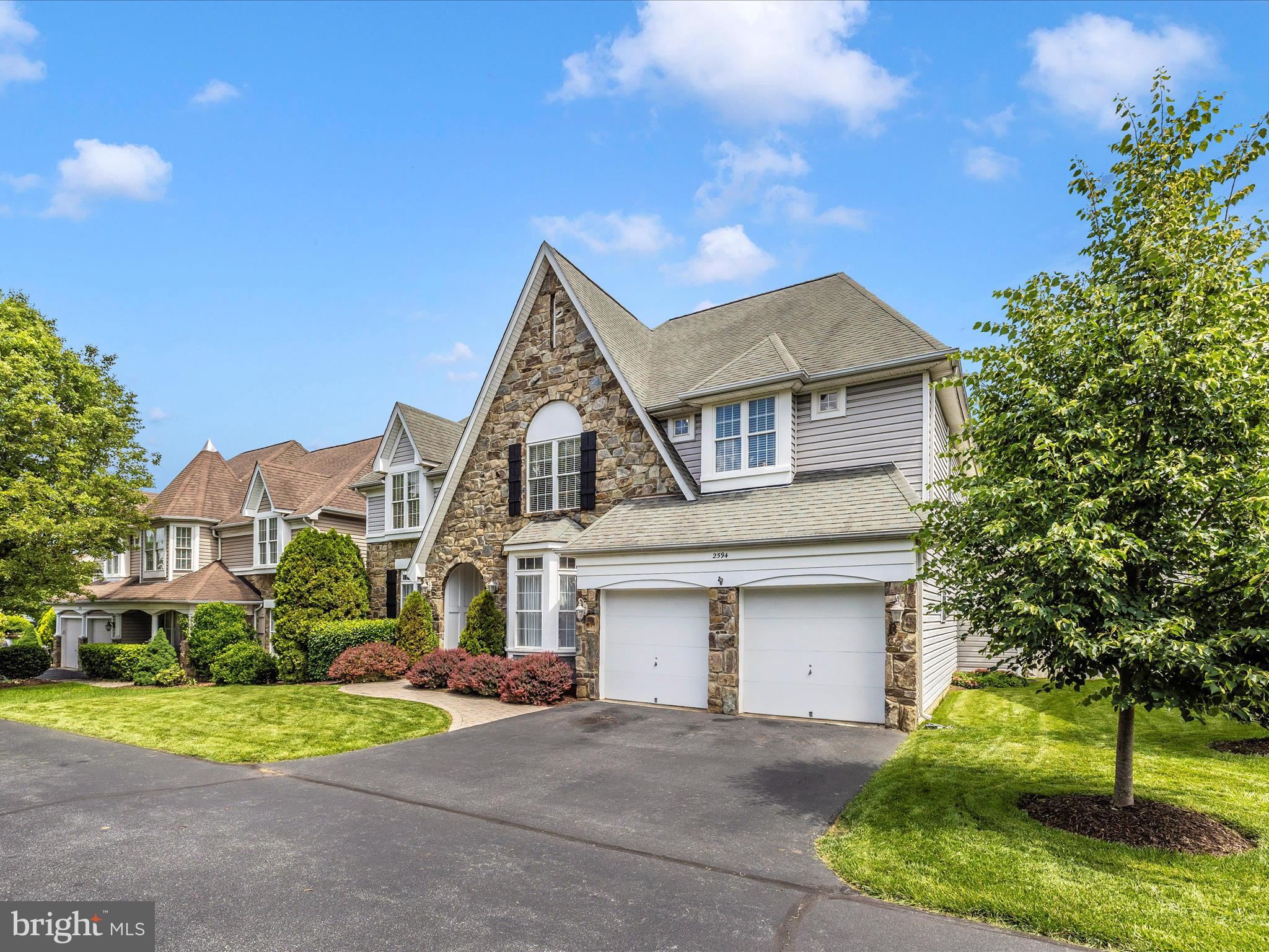 2594 Bear Den Road Frederick, MD 21701 - Photo 44 of 72 a front view of a house with a yard and garage