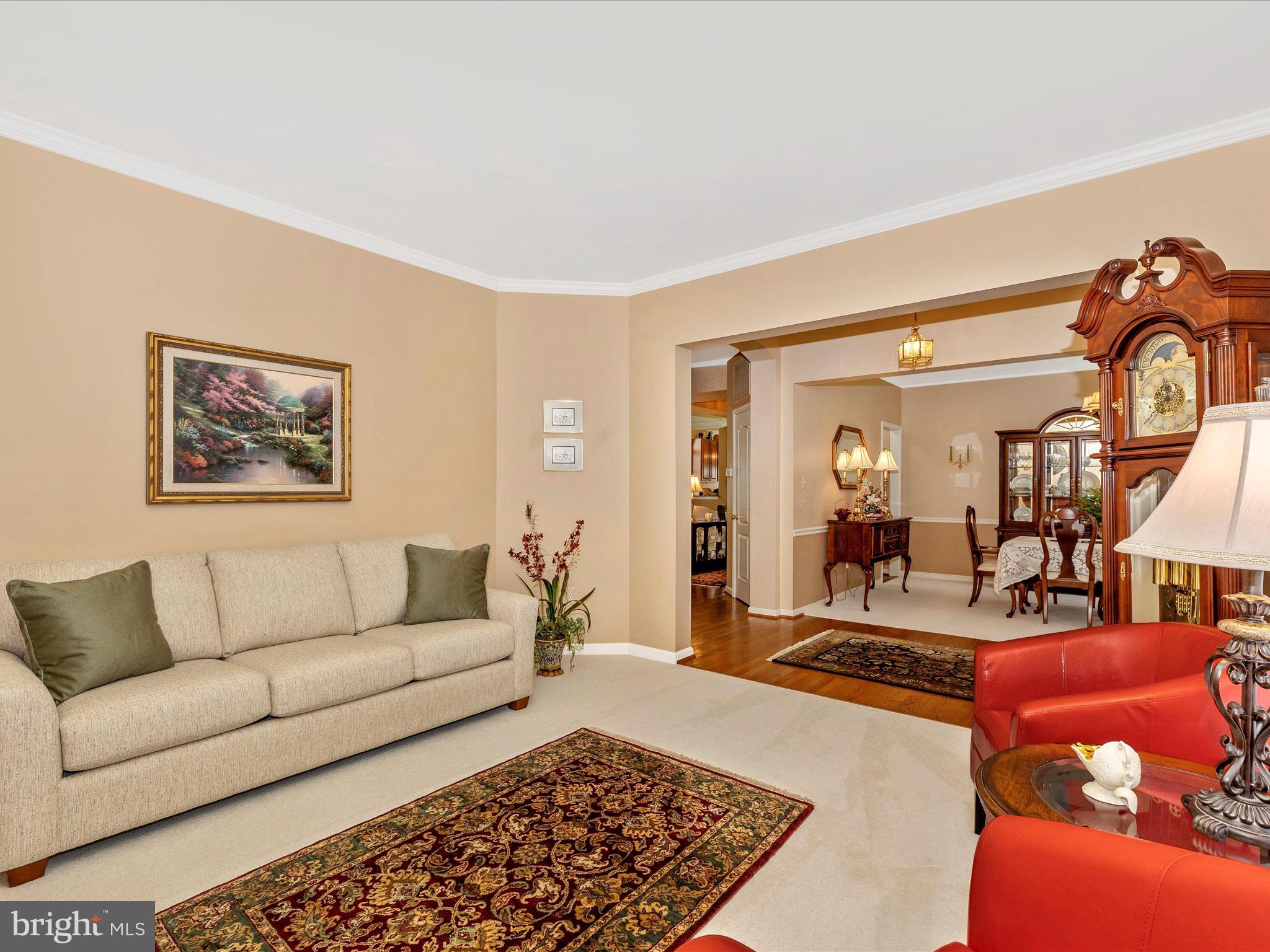 2594 Bear Den Road Frederick, MD 21701 - Photo 6 of 72 a living room with furniture and a rug