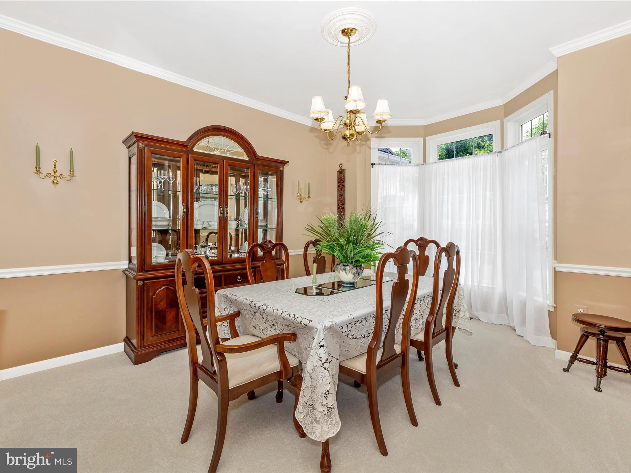 2594 Bear Den Road Frederick, MD 21701 - Photo 7 of 72 a view of a dining room with furniture and a chandelier