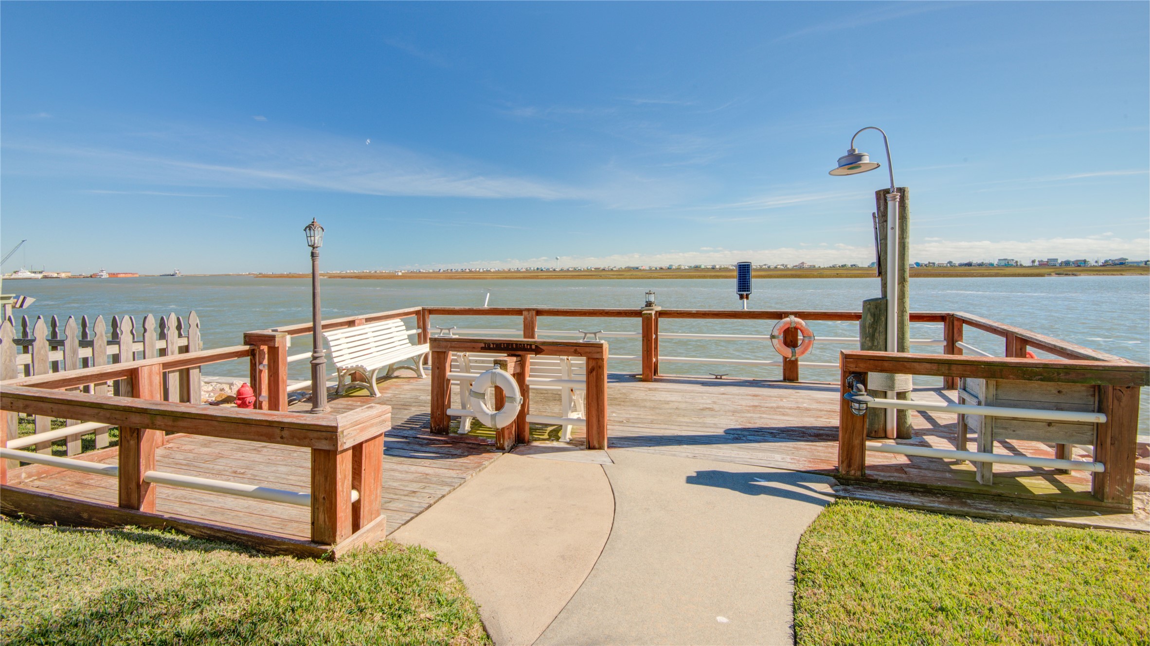 83 Dolphin Lane Freeport, TX 77541 - Photo 5 of 39 a view of a balcony with chairs