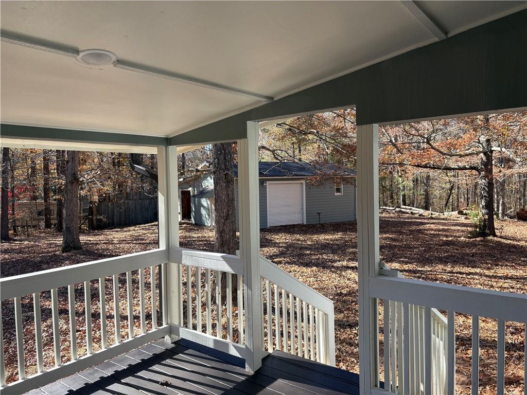 59 Woodhaven Path Rockmart, GA 30153 - Photo 15 of 17 a view of a large room with wooden floor & fence