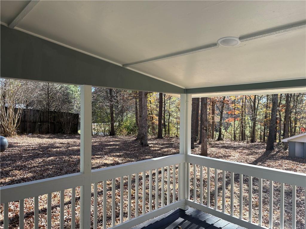59 Woodhaven Path Rockmart, GA 30153 - Photo 16 of 17 a view of a porch with wooden floor and outdoor space