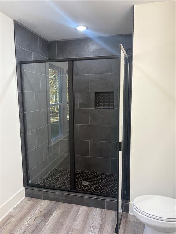 59 Woodhaven Path Rockmart, GA 30153 - Photo 9 of 17 a bathroom with a shower and toilet