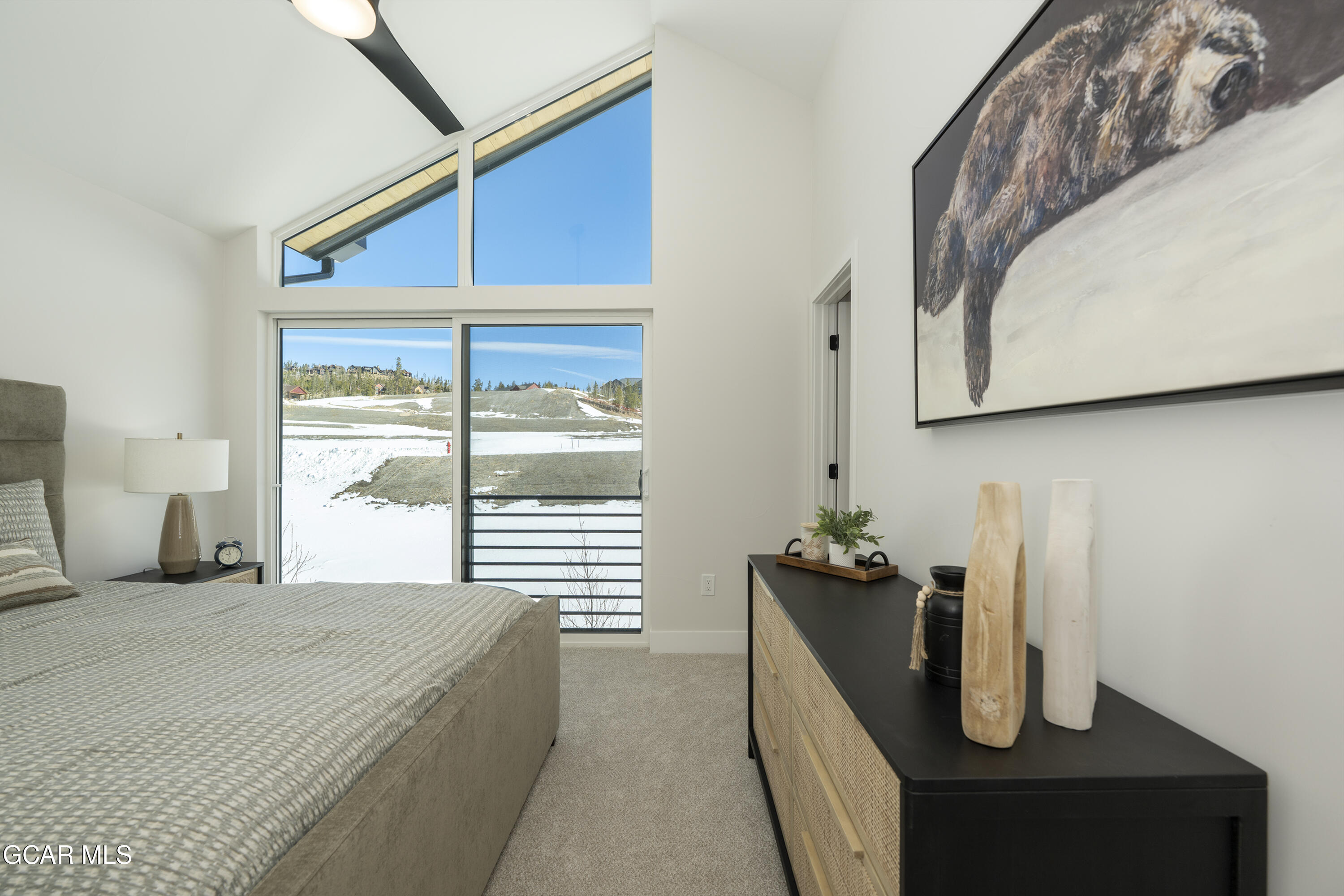 30 Wheeler Road Winter Park, CO 80482 - Photo 30 of 42 a bedroom with a large bed and a window