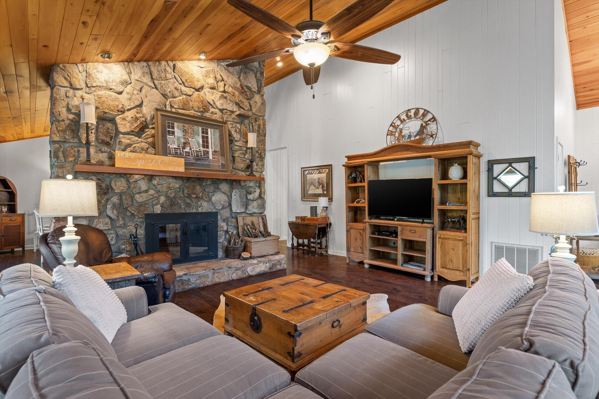 657 Brock Road Chickamauga, GA 30707 - Photo 21 of 55 a living room with furniture a flat screen tv and a fireplace