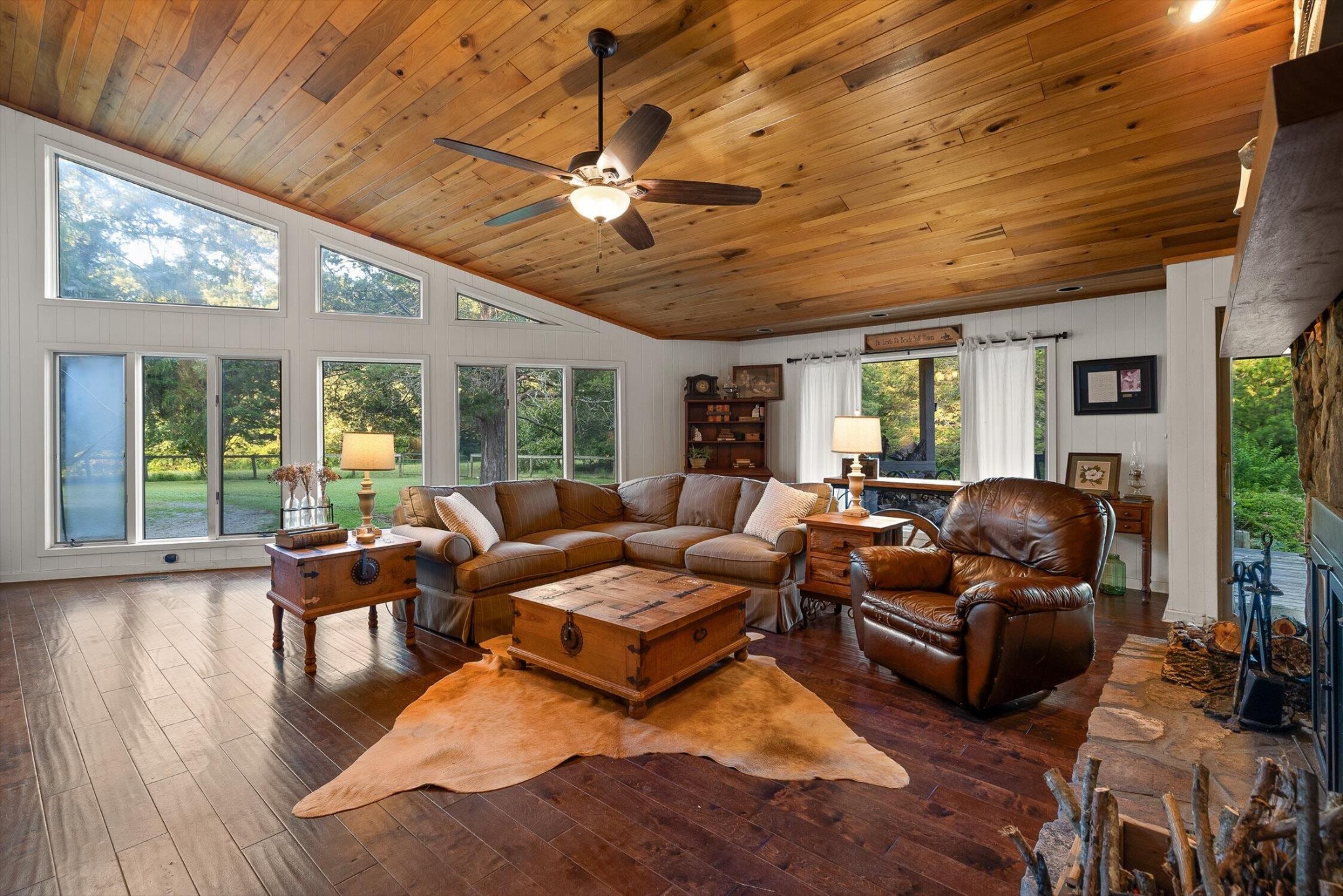 657 Brock Road Chickamauga, GA 30707 - Photo 22 of 55 a living room with furniture flat screen tv and a large window