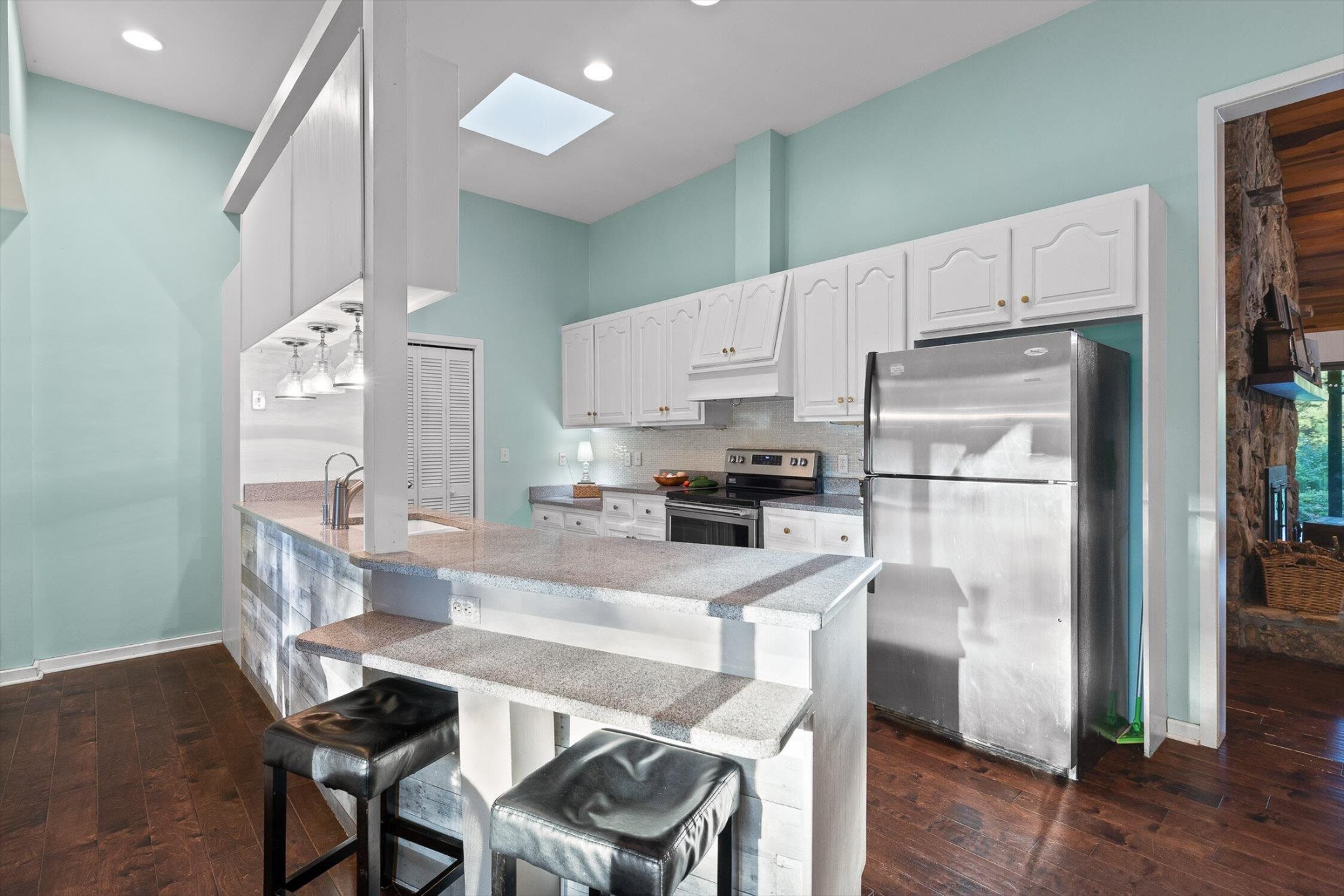 657 Brock Road Chickamauga, GA 30707 - Photo 24 of 55 a kitchen with stainless steel appliances a refrigerator a stove a dining table and chairs