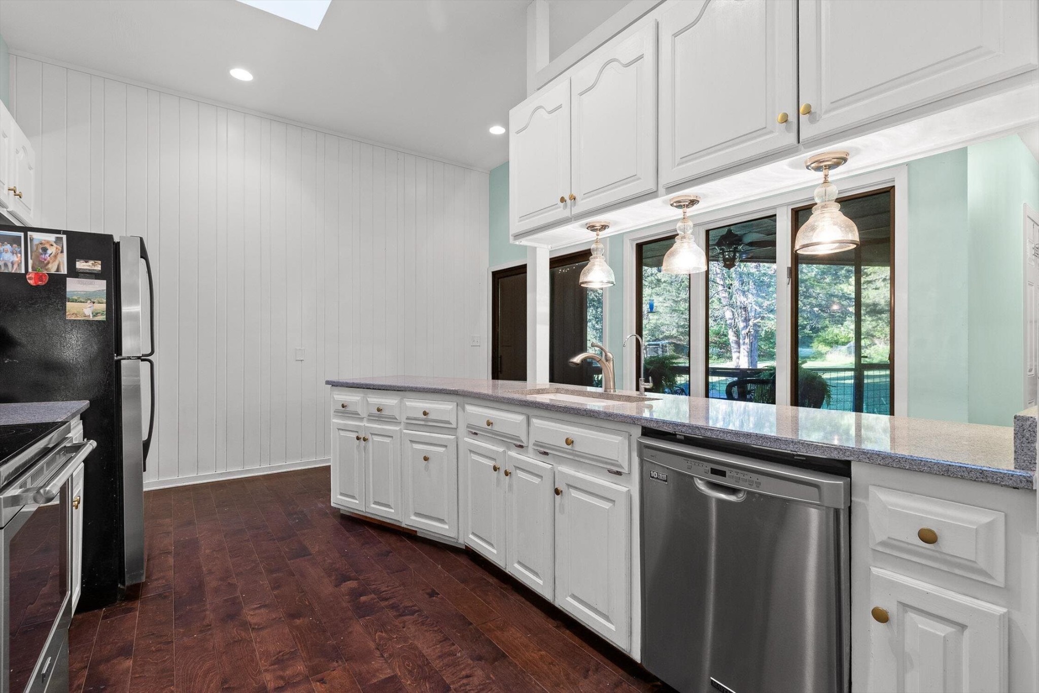 657 Brock Road Chickamauga, GA 30707 - Photo 26 of 55 a kitchen with granite countertop white cabinets and white appliances