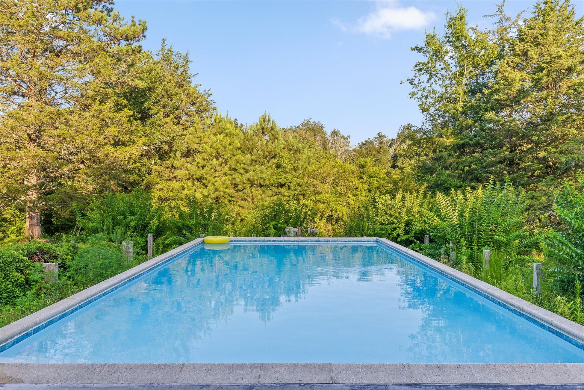 657 Brock Road Chickamauga, GA 30707 - Photo 35 of 55 a view of a swimming pool with a backyard